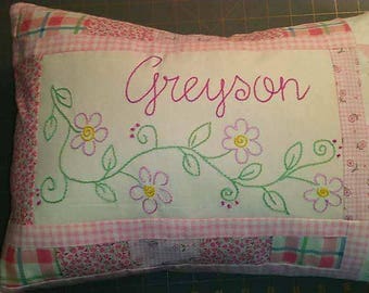 Personalized, hand-embroidered pillows