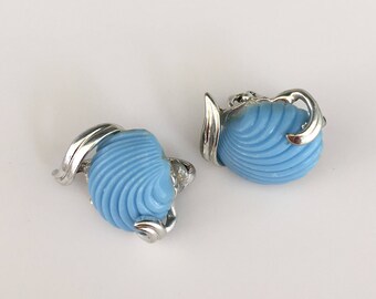 Vintage signed Coro shell clip on earrings .