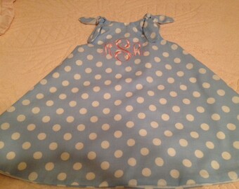 Infant and girls reversible swing dress with monogram.