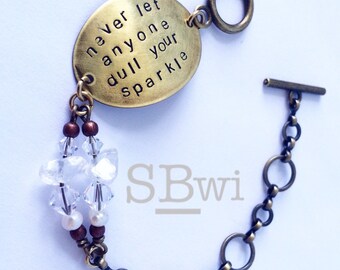 Never let anyone dull your sparkle bracelet with Swarovski and pearl detail in brass