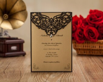 Black laser cut invitation with jewel