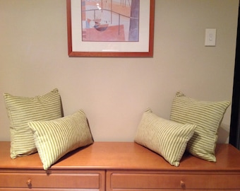 Thin striped green cushion