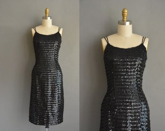 50s saucy black sparkly sequin vintage wiggle dress for holiday party. vintage 1950s dress