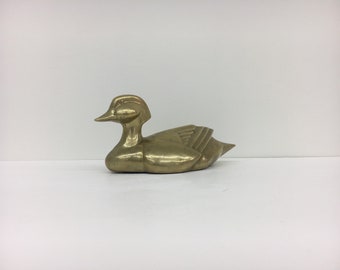 Brass Duck in a Hollywood Regency Art Deco style