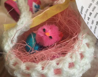 Easter basket with chick and eggs