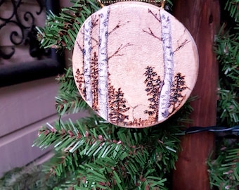 Natural view of birch, fir and pine trees, Pyrography Christmas ornament or holiday gift tag, woodburned on a birch slice for nature lovers
