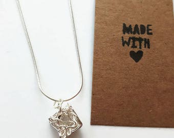 Wire wrapped cube necklace