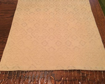 Antique gold matelasse table runner with beaded trim, 34" x 13 1/2"
