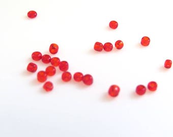 10 g fine 2 mm translucent red seed beads