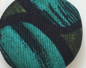Three vintage fabric covered buttons