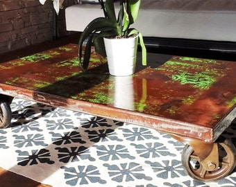 Metal wheels in cast iron industrial coffee table