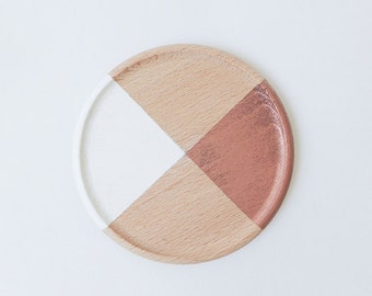 Wooden coasters painted geometric designs