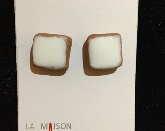 Earrings of red earthenware enameled white