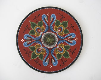 Norwegian Rosemaling on a 12 inch beaded plate