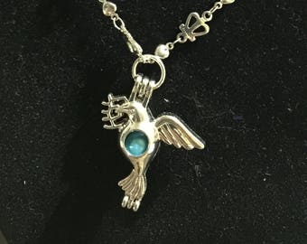 Bird with bright blue pearl fashion designed necklace