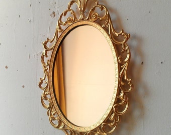Gold Princess Mirror in Ornate Vintage Oval Frame 10 by 7 inches