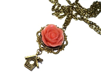 Rose with bird feeder chain