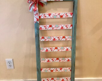 One of a kind, large, bow holder created from an old frame.