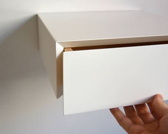 Minimalist white floating nightstand