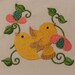 Gold bird with pink and blue flowers machine embroidery design
