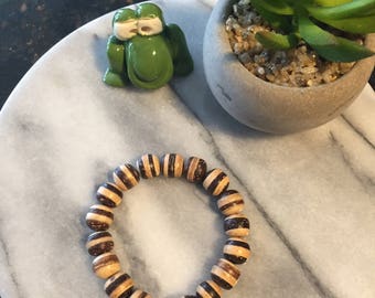 Brown and cream stripped wooden beads stretch elastic bracelet