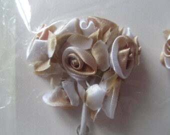 set of 2 bunches of 7 flowers each on metal rod - light brown and cream satin is 14 flowers
