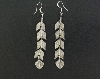 Long sterling silver feather dangle earrings