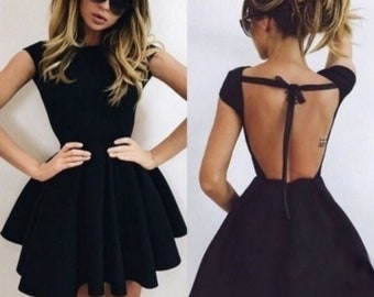 Black dress neckline behind