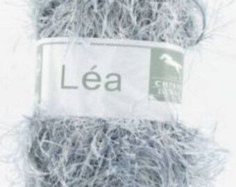 Sam gray fancy yarn and dark No. 211 white horse