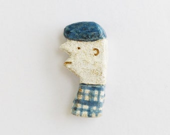 Be pointed and clay brooch