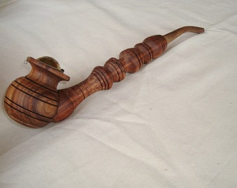 Wooden pipe. Smoking pipe. Tobacco smoking pipe
