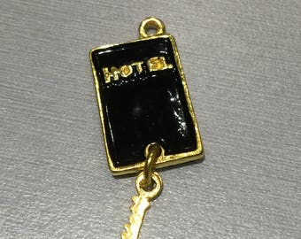 Black enamel gold HOTEL key
