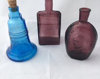 Three Wheaton reproduction glass bottles