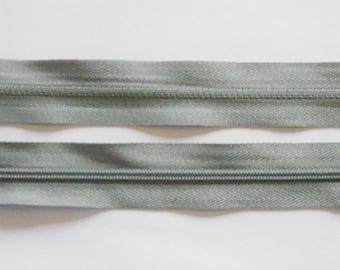 Zipper zips grey