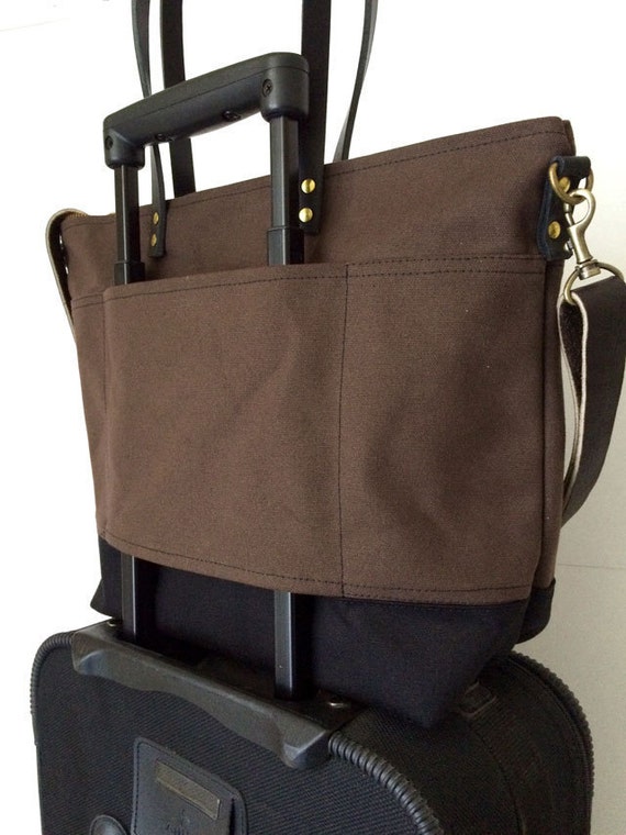 bag with suitcase strap