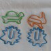 set of 4 paperclip shaped animal turtle, rabbit, hedgehog metal color green, orange, blue