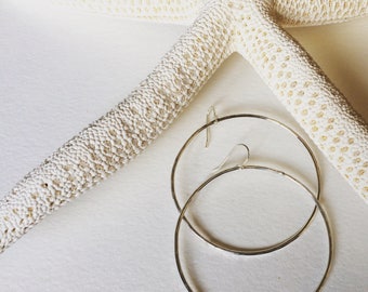 Sterling Silver Hoops.