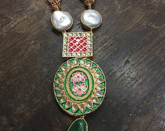 Beautiful pearl necklace with green and pink pendant