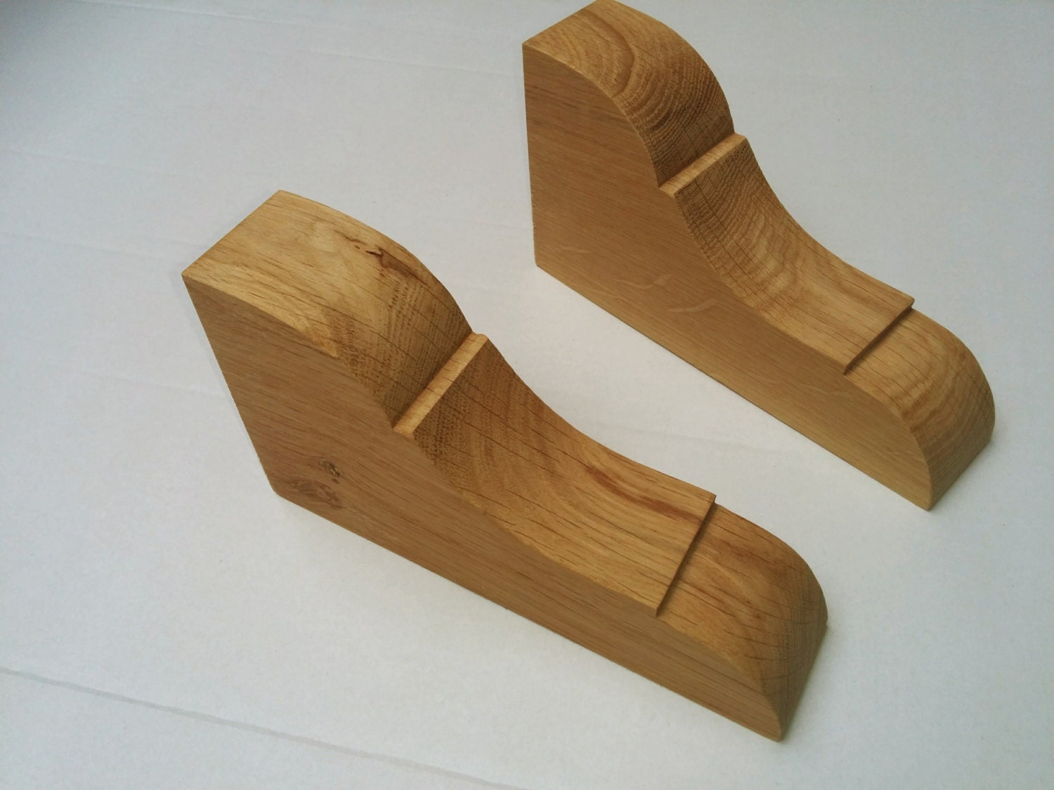 oak corbel pair for decorative or shelf bracket support.