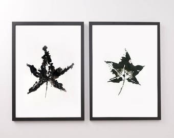 Painting with black and white leaf