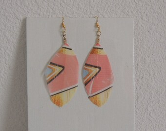 These earrings different colors of feathers.