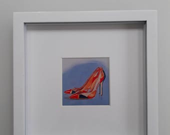 Orange and green stiletto shoes Framed Print