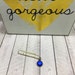 One Blue Jeweled Metal Clip