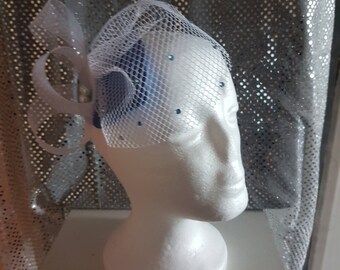 Teardrop facinator with birdcage veil