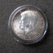 1964 90% silver uncirculated half dollar with cartwheel toning