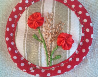 embroidered brooch