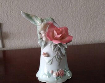 Cosmos humming bird and flower bell