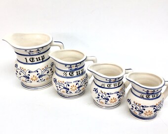 HERITAGE by ROYAL SEALY Measuring Cup Set of 4 Glazed White Ceramic Pitcher Style Vessels w/Nordic Blue & Yellow-Gold Stylized Flower Design