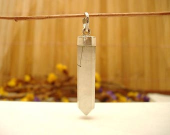 Sterling Silver and tourmalated Quartz.