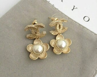 Gold golden CC earrings flower